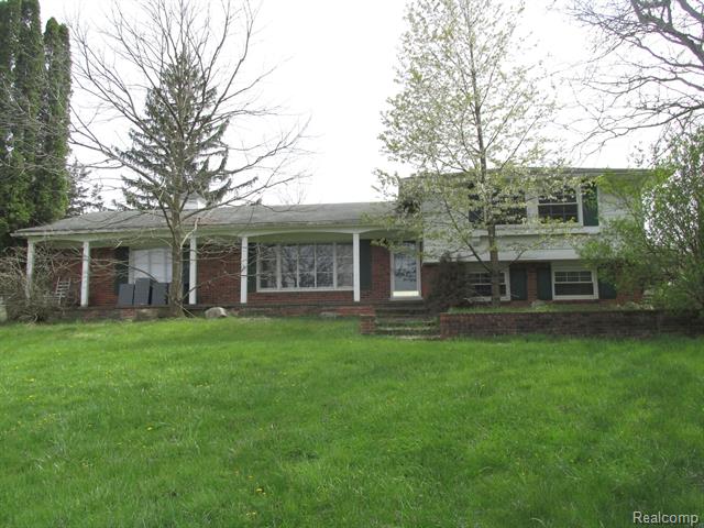 front view picture of 1261 Brauer Road, Oxford, MI. 48371