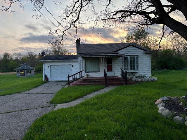 front view picture of 7335 Vassar Road, Otisville, MI. 48463