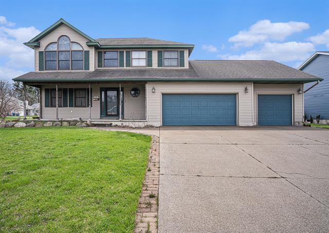 front view picture of 636 Birkdale Court, Coopersville, MI. 49404