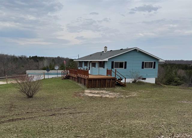 front view picture of 3135 Montgomery Road, Bellaire, MI. 49615