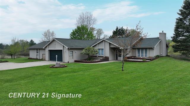 front view picture of 5489 Winchester Way, Gladwin, MI. 48624