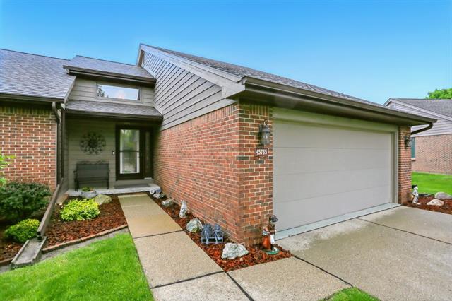 front view picture of 45765 Meadows Cir W, Macomb, MI. 48044
