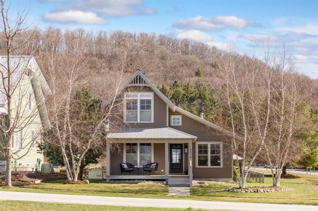front view picture of 9979 W Michigan Street, Empire, MI. 49630