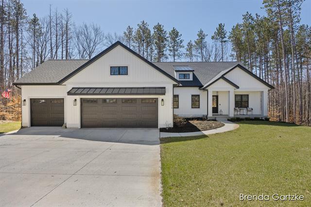 front view picture of 13456 Windy Craig Drive, Gowen, MI. 49326