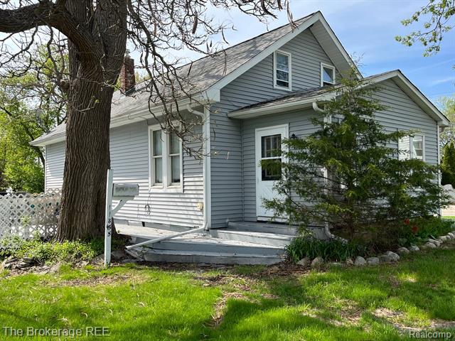 front view picture of 11855 Temperance Street, Mount Morris, MI. 48458