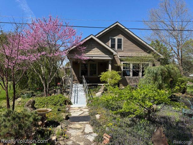front view picture of 559 Heenan Drive, Lapeer, MI. 48446