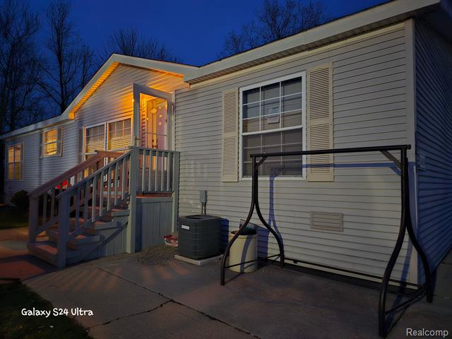 front view picture of 10414 N Park Street, Casco, MI. 48064