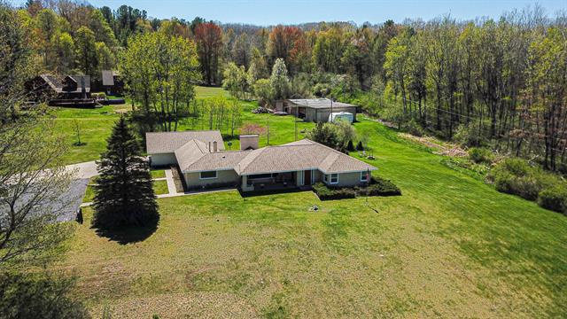 front view picture of 7198 Farr Road, Onekama, MI. 49675