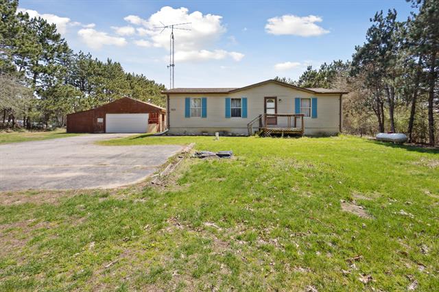 front view picture of 10365 Easton Road, Rives Junction, MI. 49277