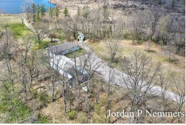 front view picture of 12375 Overlook Drive Ne, Greenville, MI. 48838