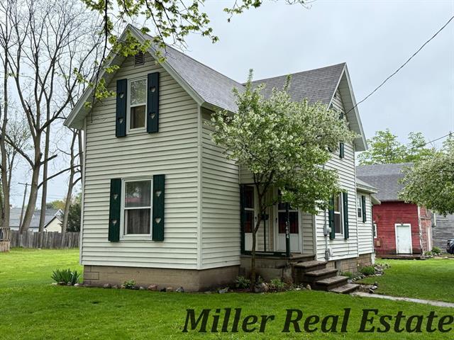 front view picture of 1404 Johnson Street, Lake Odessa, MI. 48849