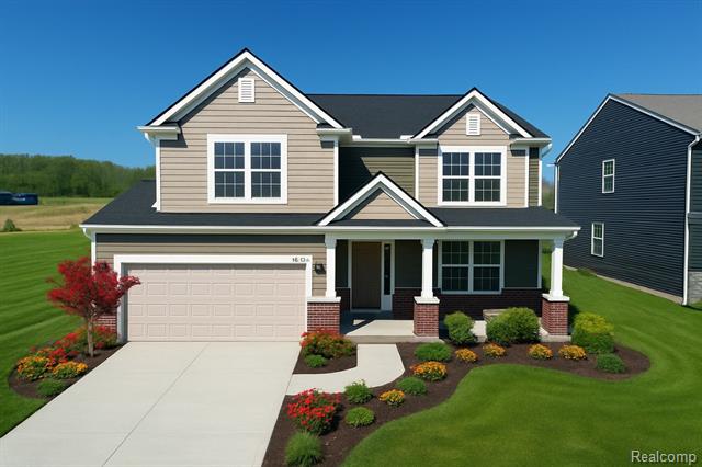 front view picture of 30112 Norway Drive, New Hudson, MI. 48165