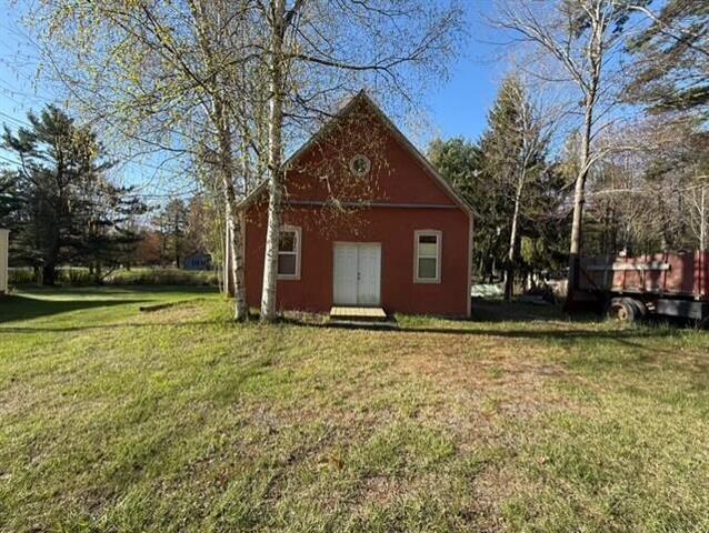 front view picture of 7224 County Farm Road, Lexington, MI. 48450