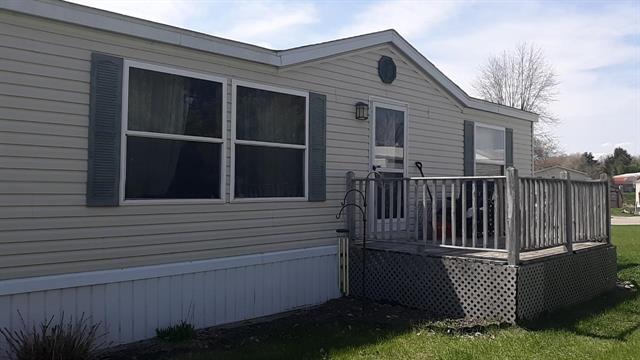 front view picture of 8775 Country View Drive Nw, Sparta, MI. 49345