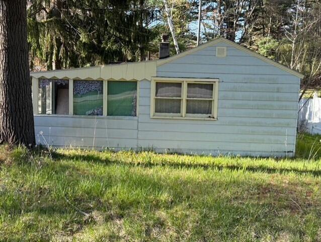 front view picture of 7218 County Farm Road, Lexington, MI. 48450