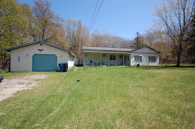 front view picture of 2993 N Ogemaw Trail, West Branch, MI. 48661