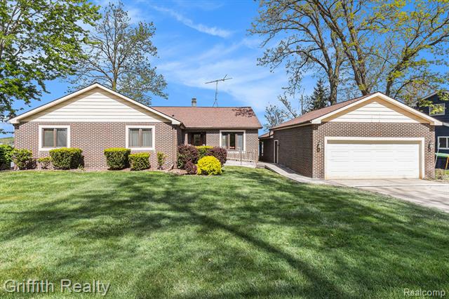 front view picture of 8570 Riverside Drive, Brighton, MI. 48116