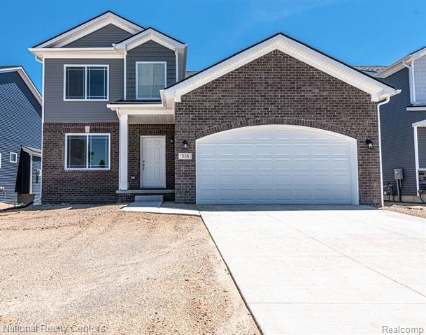 front view picture of 53172 Woodland Meadows, New Baltimore, MI. 48047