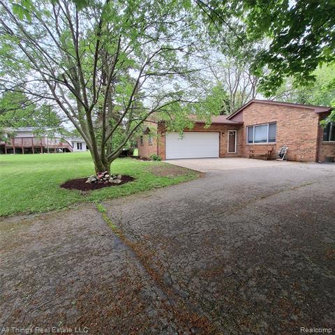 front view picture of 3827 Woodland Drive, Metamora, MI. 48455