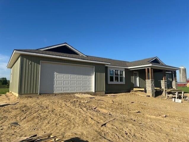 front view picture of 9745 W Michigan Avenue, Grass Lake, MI. 49240
