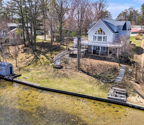 front view picture of 8010 Lumberjack Drive, Mears, MI. 49436