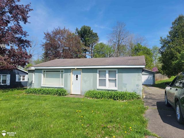 front view picture of 453 State Road, Otisville, MI. 48463