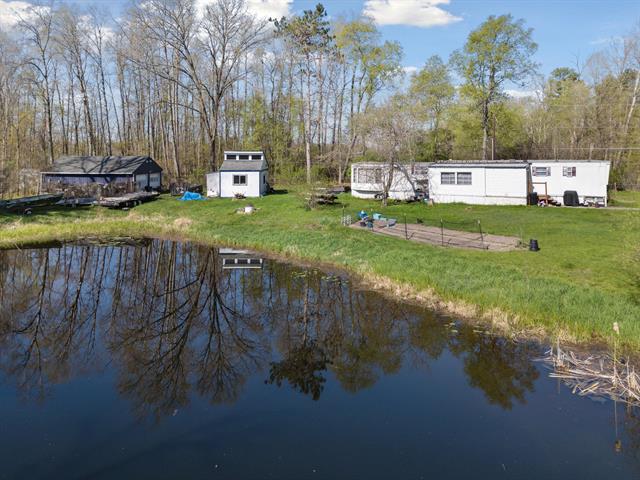 front view picture of 18261 15 Mile, Road, Big Rapids, MI. 49307