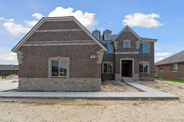 front view picture of 19266 Thompson Drive, Macomb, MI. 48042