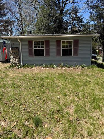front view picture of 8687 Reiss Drive, Farwell, MI. 48622