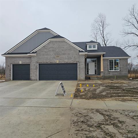 front view picture of 50009 Mustang Drive, Macomb, MI. 48042