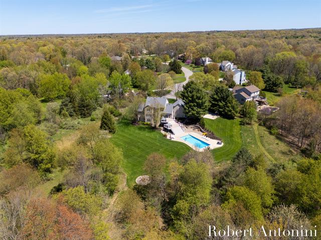 front view picture of 7707 Forest Court Ne, Rockford, MI. 49341