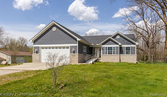 front view picture of 10207 Dodge Road, Otisville, MI. 48463