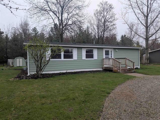 front view picture of 216 N West Street, Au Gres, MI. 48703