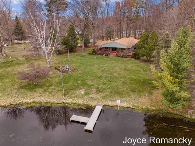 front view picture of 4021 E Shore Drive, Stanton, MI. 48888