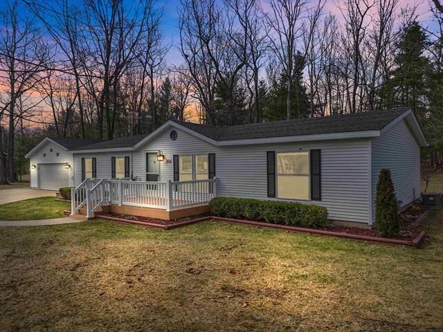 front view picture of 202 Forestville Road, Houghton Lake, MI. 48629