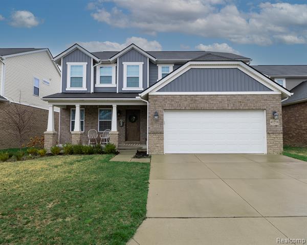 front view picture of 41218 Rugosa Drive, Clinton Township, MI. 48038