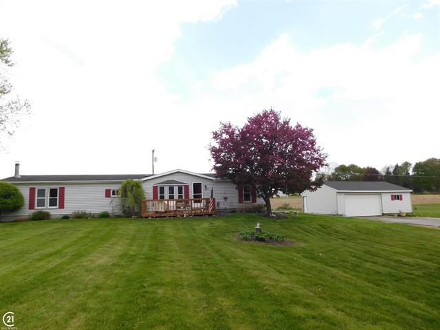 front view picture of 5568 Hollow Corners Road, Dryden, MI. 48428