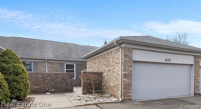 front view picture of 48310 Seawind, Utica, MI. 48315