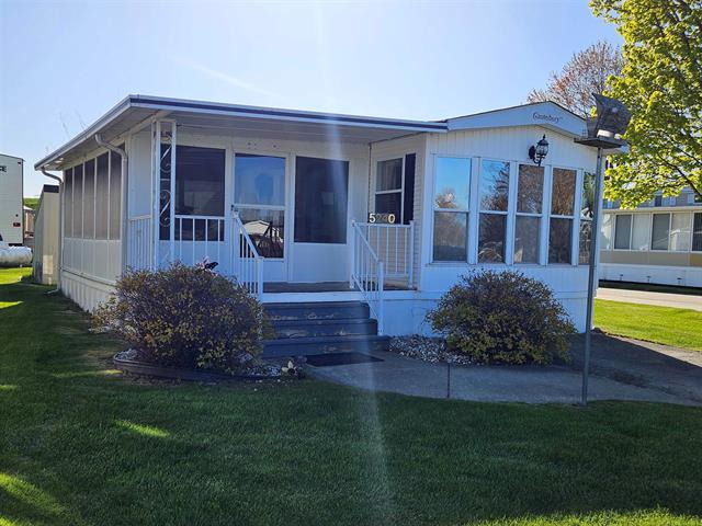 front view picture of 5240 Constitution Lane, Lexington, MI. 48450