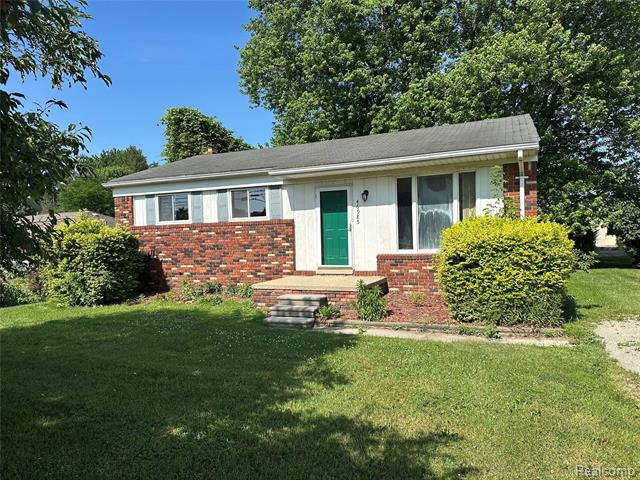 front view picture of 46985 Heydenreich Road, Macomb, MI. 48044