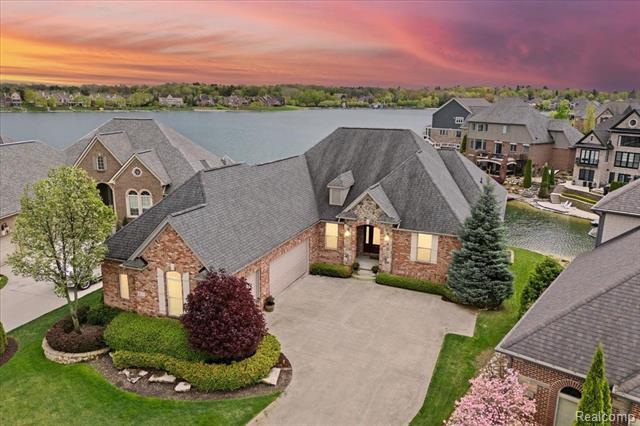 front view picture of 8427 Boulder Shores Drive, South Lyon, MI. 48178