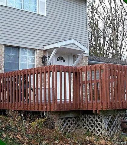 front view picture of 3936 Hunters Ridge Drive, Lansing, MI. 48911