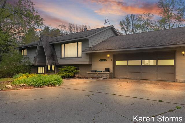 front view picture of 3906 E Sternberg Road, Fruitport, MI. 49415