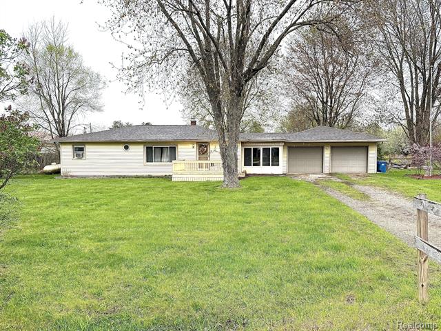 front view picture of 8222 Frances Road, Flushing, MI. 48433