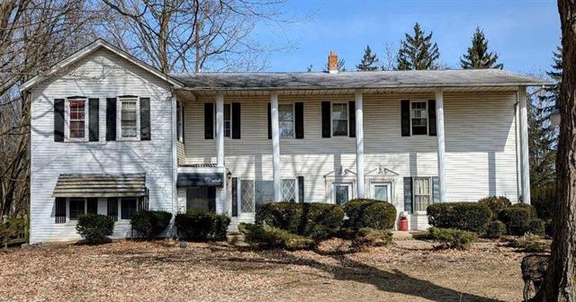 front view picture of 6681 6 Mile Road, Northville, MI. 48168