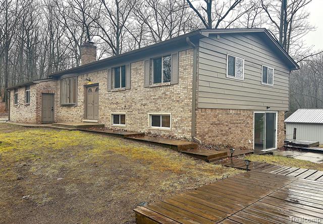 front view picture of 206 Slippery Jack Drive, Roscommon, MI. 48653