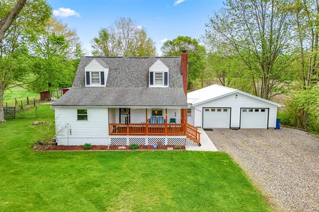 front view picture of 465 Ridge Road, Quincy, MI. 49082