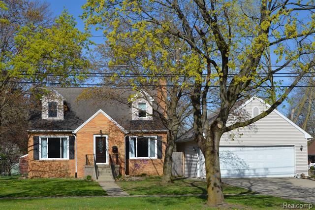 front view picture of 411 N Mckinley Road, Flushing, MI. 48433