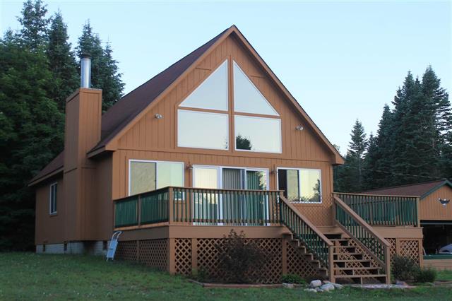 front view picture of 1242 W 20 Road, Mesick, MI. 49668
