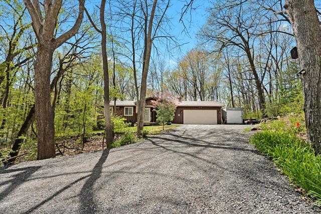 front view picture of 8130 Teahen Road, Brighton, MI. 48116